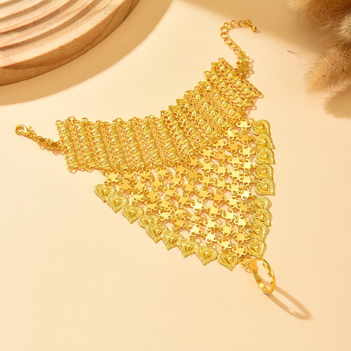 Heart-Shaped Tassel Ethnic Bracelet with Golden Detailing